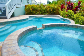 3 king bedrooms with their own bathroom, den area with bunk beds, private pool, bikes & beach gear